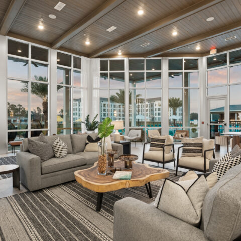 Lounge area in the clubhouse lobby by the pool at Sanctuary at Daytona